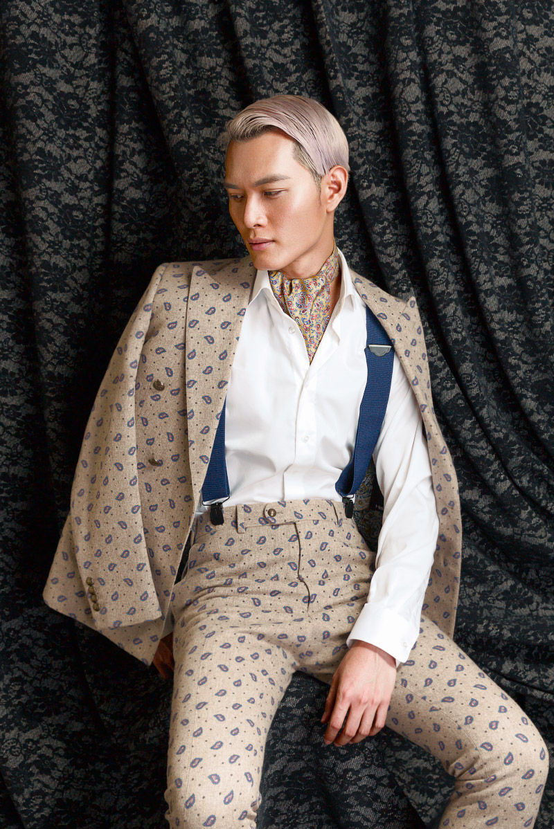 Male fashion model wearing luxury suit